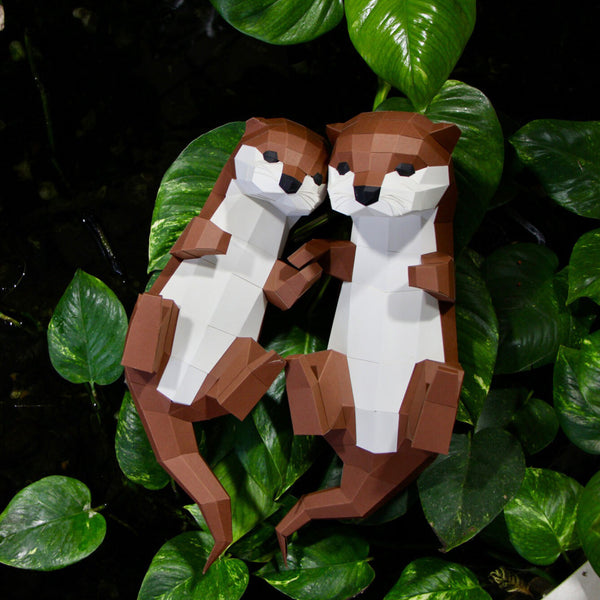 Papiertrophäe zwei kleine Otter